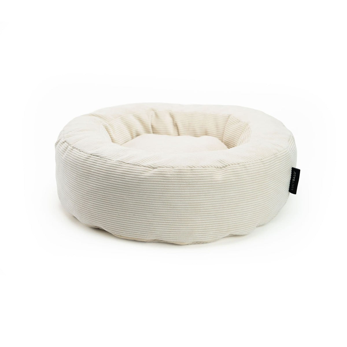 Katzenbett aus cremeweißem Cordstoff – minimalistisches Design trifft auf weichen Komfort.