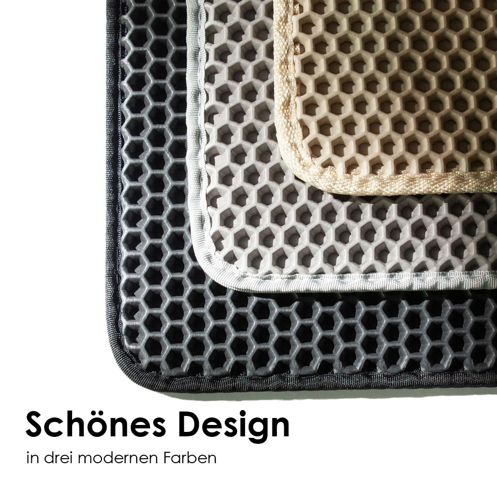 nahaufnahme von drei farbvarianten der katzenstreu matte, sand, grau und schwarz, mit text: "schönes design"